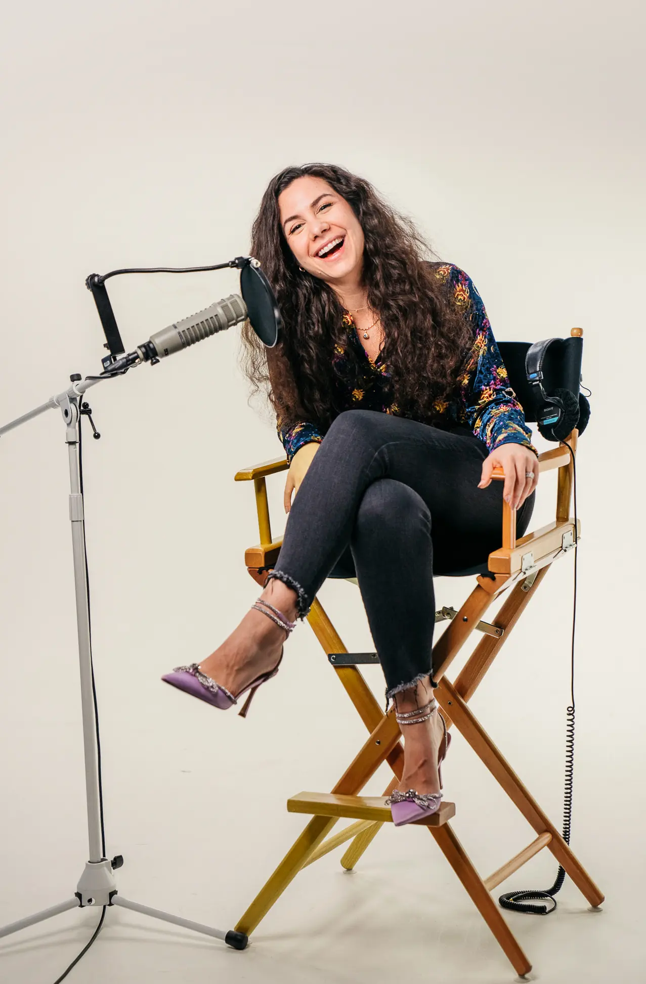 Me sitting in a podcasting seat in the studio